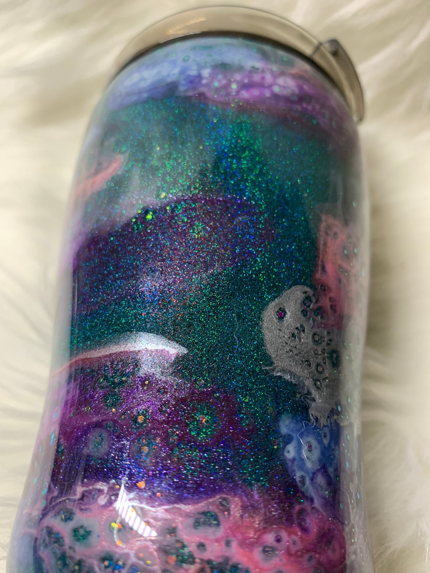 12 oz Modern Curve Teal base with alcohol swirls, glitter and glow