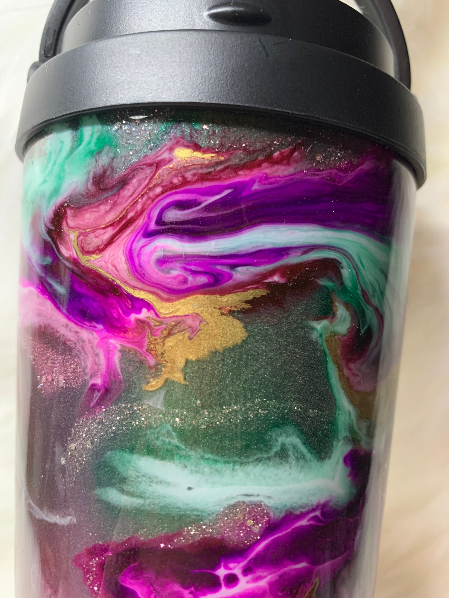 24 oz  Tapered Travel Mug.  Mica base, Alcohol inks swirled with glow